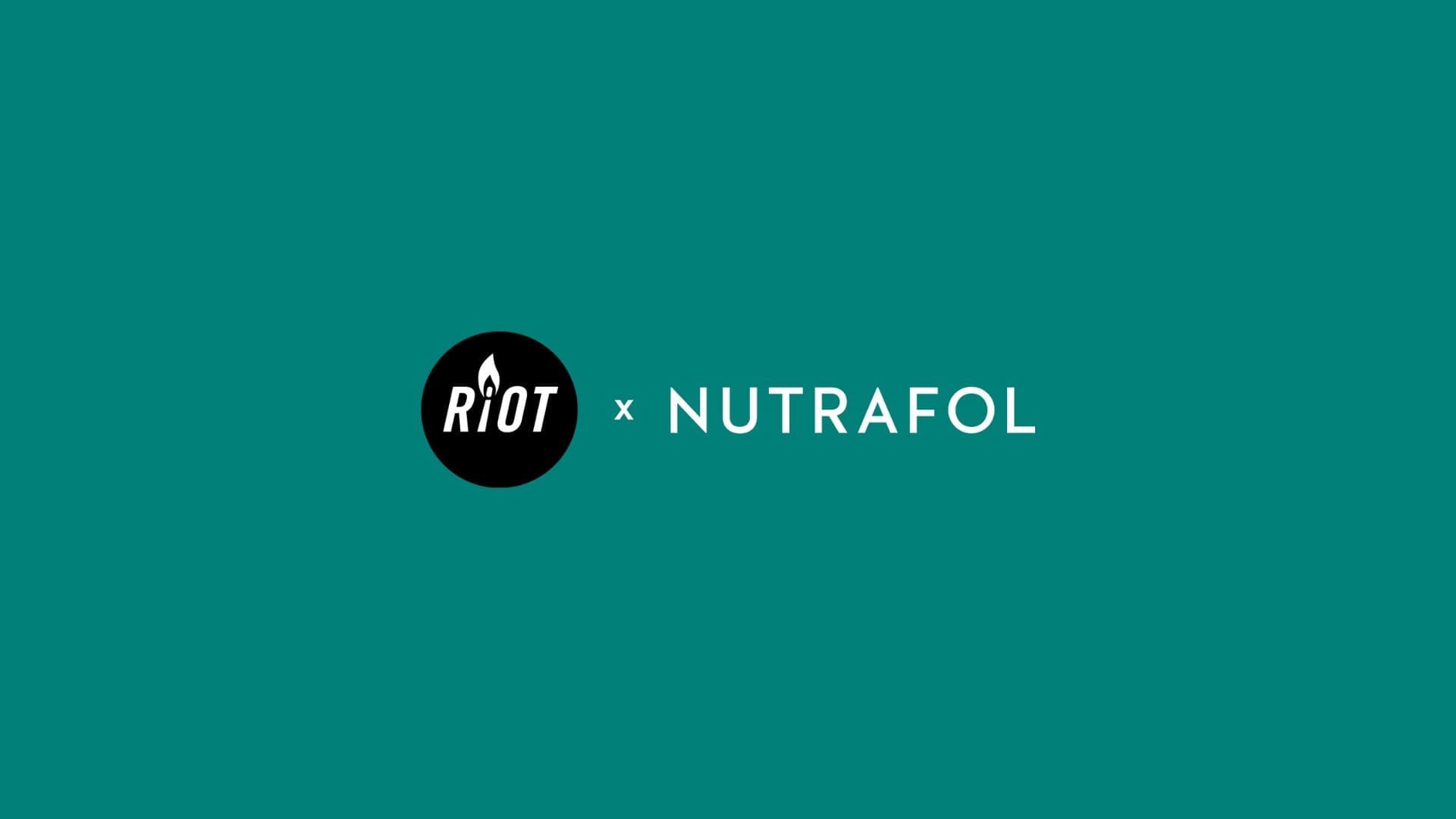 RIOT, NYC Creative Agency: Logo of RIOT x NUTRAFOL collaboration displayed on a teal background, symbolizing the partnership between RIOT creative agency and Nutrafol hair wellness company. Logo of RIOT x NUTRAFOL collaboration displayed on a teal background, symbolizing the partnership between RIOT creative agency and Nutrafol hair wellness company.