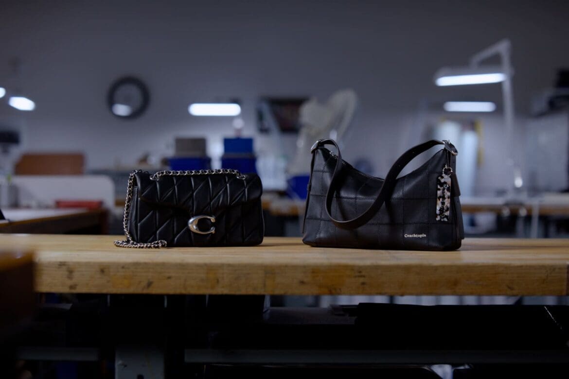 The Coach Quilted Tabby and Coachtopia Alter/Ego bag on the workshop table.