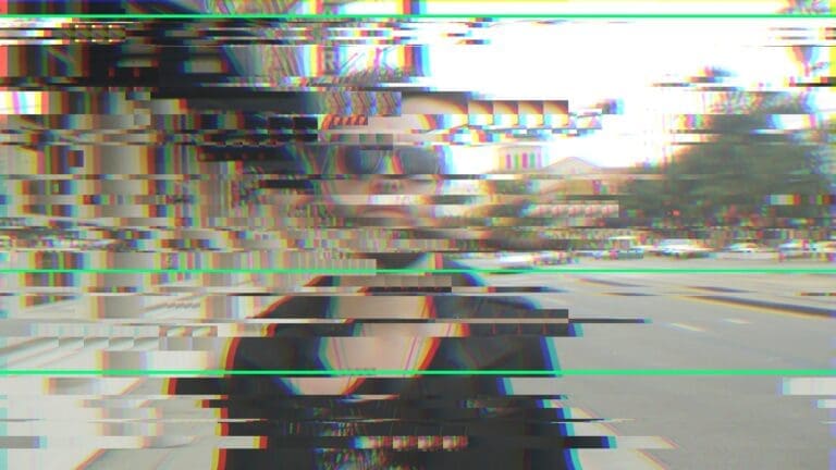 A corrupted, glitching frame of MUG5 from the lost 2011 Gravity edit