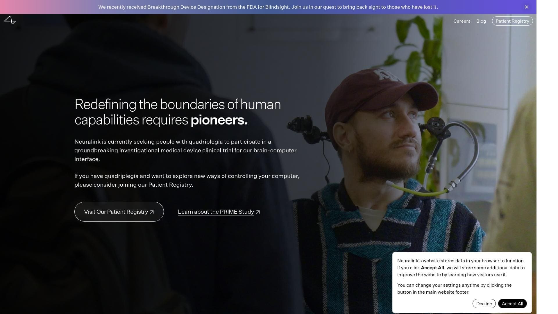 Neuralink homepage featuring a clinical trial participant with a brain-computer interface device, promoting groundbreaking medical research.