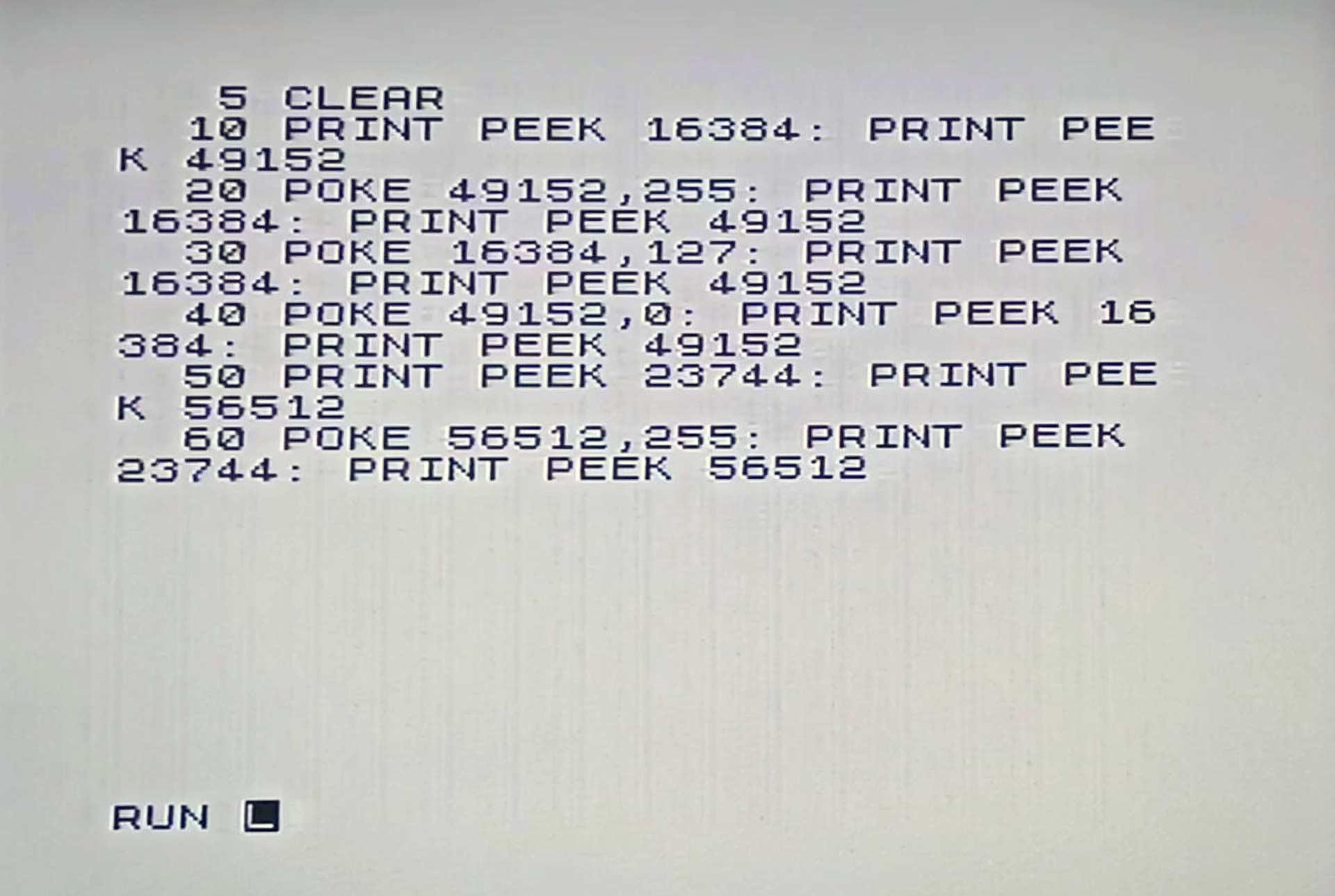 ZX Spectrum screen showing a BASIC program with PEEK and POKE commands