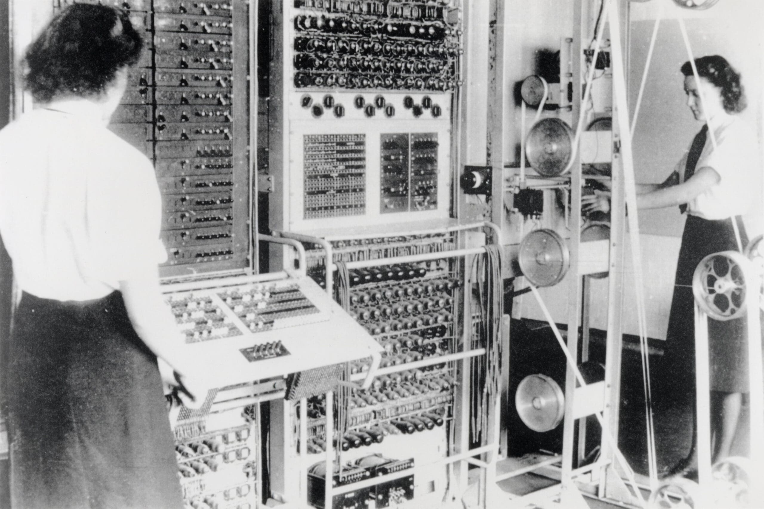 RIOT, NYC Creative Agency: Two women operating the Colossus Machine at Bletchley Park during World War II. Two women operating the Colossus Machine at Bletchley Park during World War II.